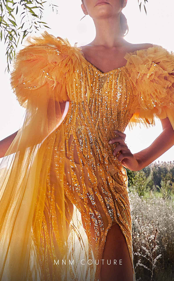 MNM Couture K3934 sheath gown with rosette embellishment, high slit, and cascading sash details. | Couture Shop LA