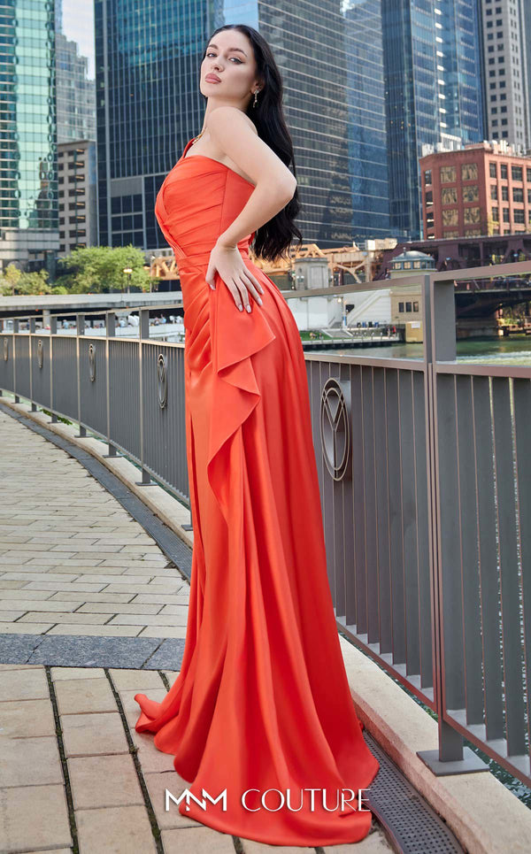 MNM Couture K3979 Satin one-shoulder evening dress with draped train, fitted bodice, and bold slit for a captivating appearance. | Couture Shop LA