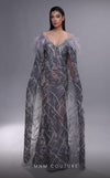 MNM Couture K4097 mermaid gown with sheer cape sleeves, feather details, and intricate beaded motifs. | Couture Shop LA