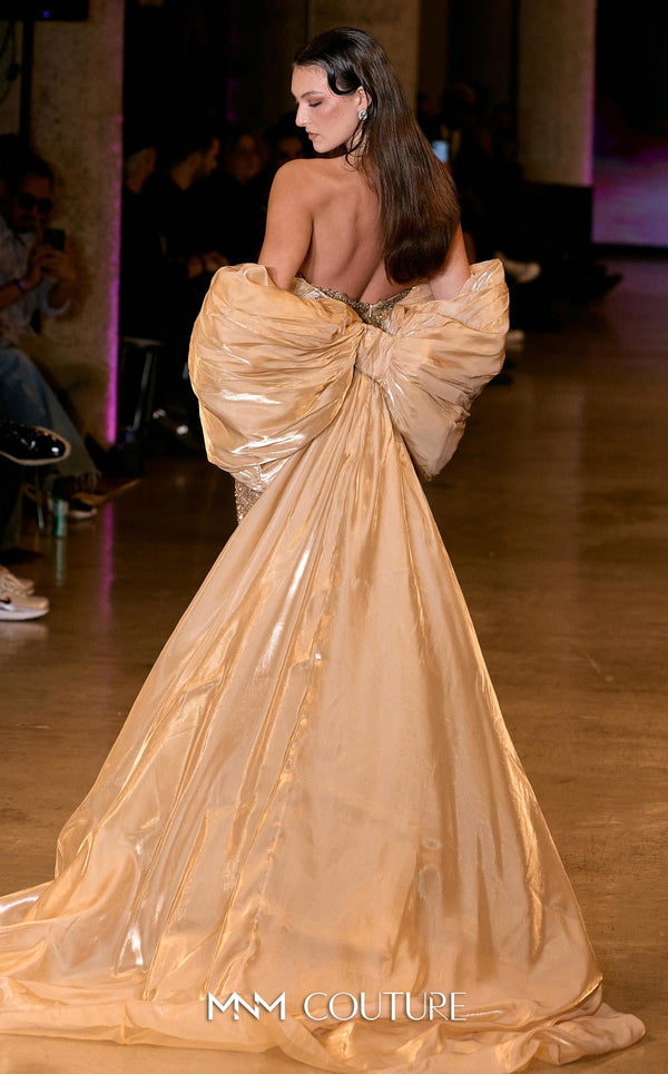 MNM Couture Style M1010 showcasing a sleeveless mermaid gown covered in gradient sequins and beading, with a round neckline and a removable long cape. | Couture Shop LA