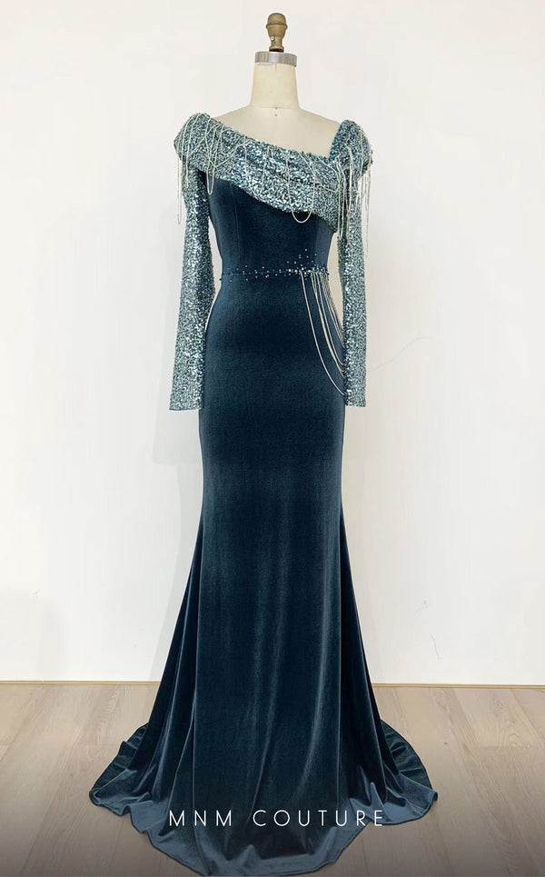 MNM Couture M1067 fitted velvet gown with embroidered long sleeves, an asymmetric neckline with hanging crystals, and a semi-flared skirt. | Couture Shop LA