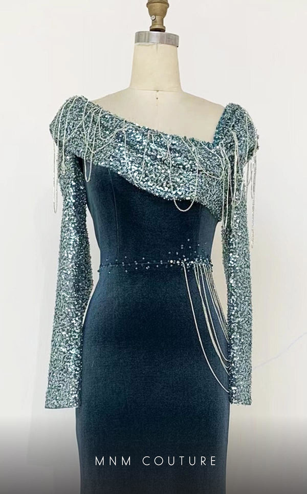 MNM Couture M1067 fitted velvet gown with embroidered long sleeves, an asymmetric neckline with hanging crystals, and a semi-flared skirt. | Couture Shop LA