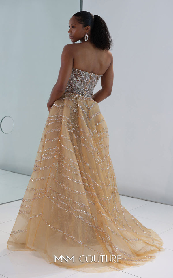 MNM Couture M1186 showcasing a sleeveless, form-fitting mermaid gown fully embellished with sequins, beads, and diamonds, featuring a deep illusion U-neckline. | Couture Shop LA