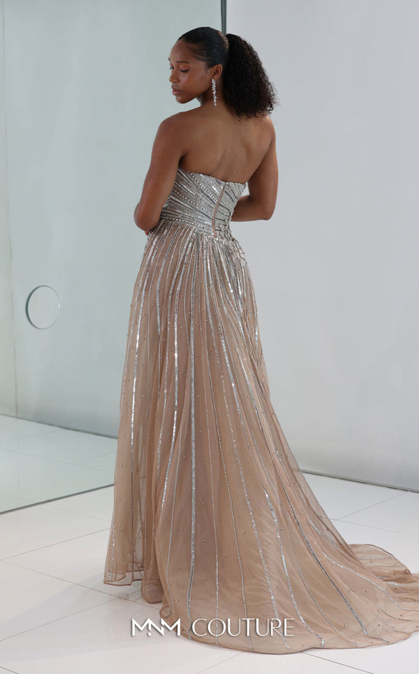 MNM Couture Style M1189 showcasing a sleeveless, fully embellished mermaid gown with a plunging illusion U-neckline, covered in sparkling sequins, beads, and diamonds. | Couture Shop LA