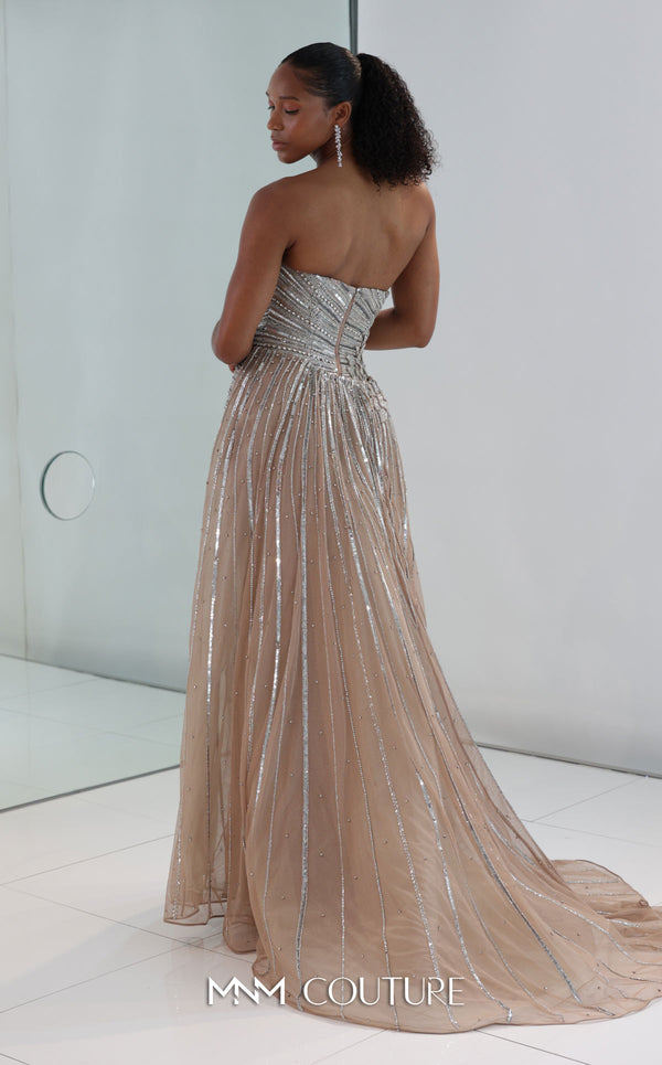 MNM Couture Style M1189 showcasing a sleeveless, fully embellished mermaid gown with a plunging illusion U-neckline, covered in sparkling sequins, beads, and diamonds. | Couture Shop LA
