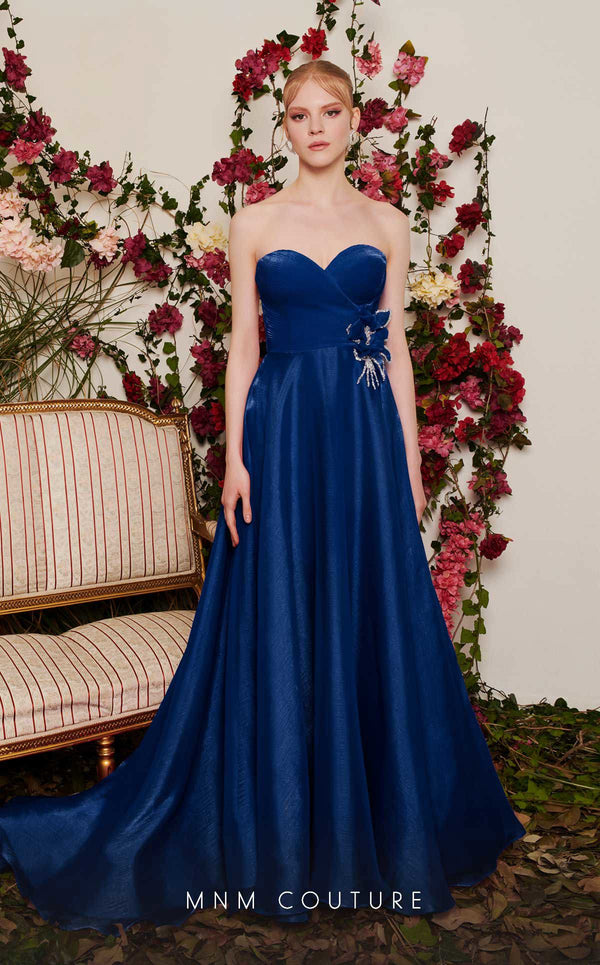 Chiffon A-line evening gown with floral embellishments, sweetheart neckline, and a flowing train. | Couture Shop LA