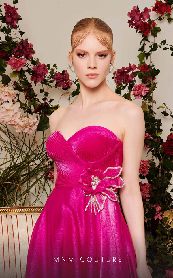 Chiffon A-line evening gown with floral embellishments, sweetheart neckline, and a flowing train. | Couture Shop LA