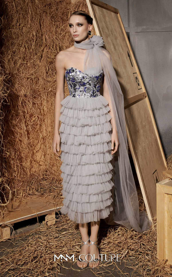 MNM Couture Style N0641 silver column maxi dress with corset-style embroidered bodice, sequins, layered organza skirt, flower-shaped neckline detail, and long train | Couture Shop LA
