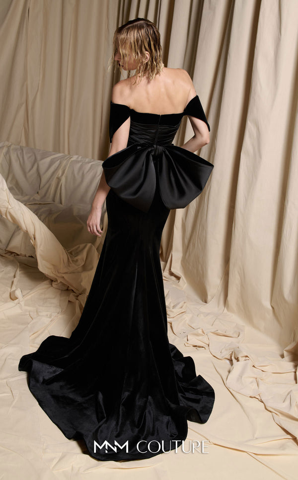 MNM Couture Style N0702 velvet mermaid gown with a sweetheart neckline, structured off-the-shoulder petal sleeves, and a large back bow. | Couture Shop LA