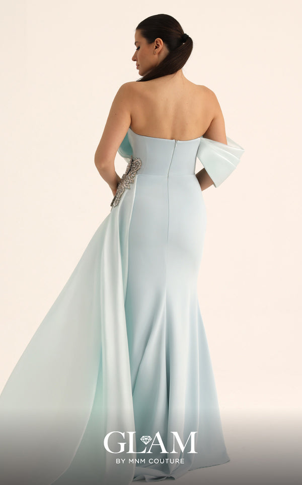 MNM Couture O07802 one-shoulder crepe organza column gown with draped bodice, crystal bow, and side train