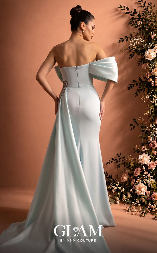 MNM Couture O07802 one-shoulder crepe organza column gown with draped bodice, crystal bow, and side train