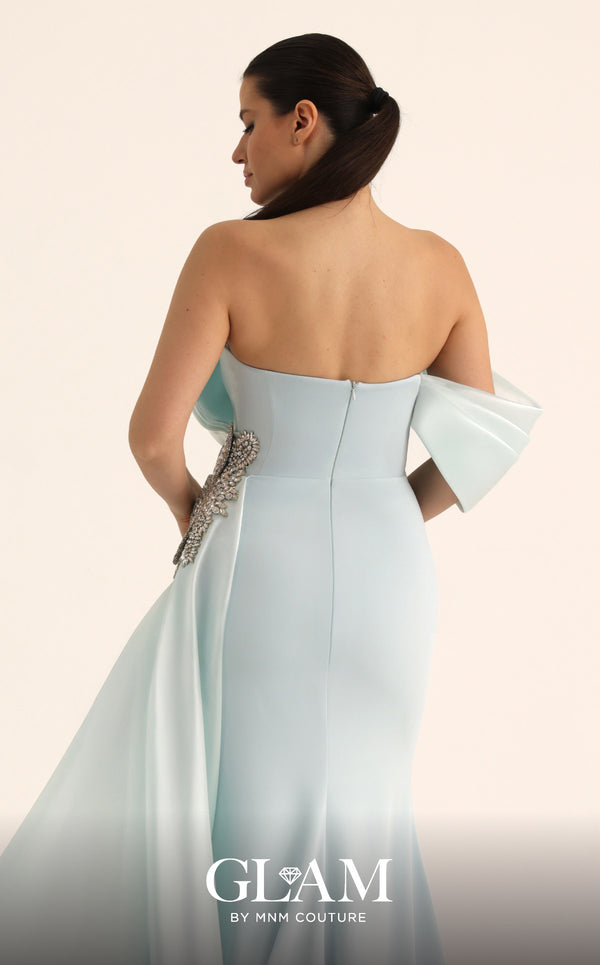 MNM Couture O07802 one-shoulder crepe organza column gown with draped bodice, crystal bow, and side train