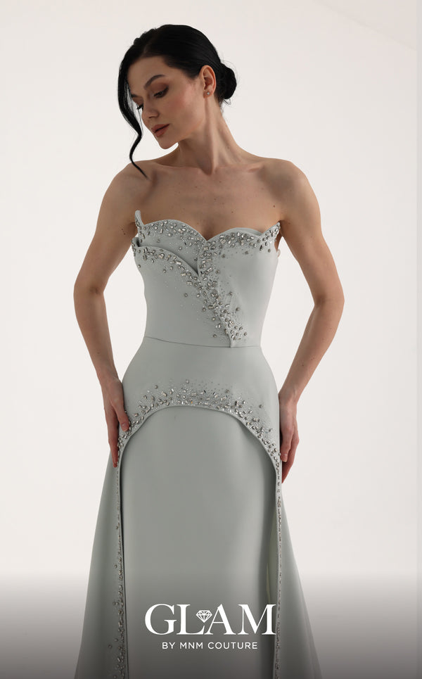 MNM Couture O07828 strapless crepe column gown with sweetheart corset, crystals, arch cut, and overskirt train