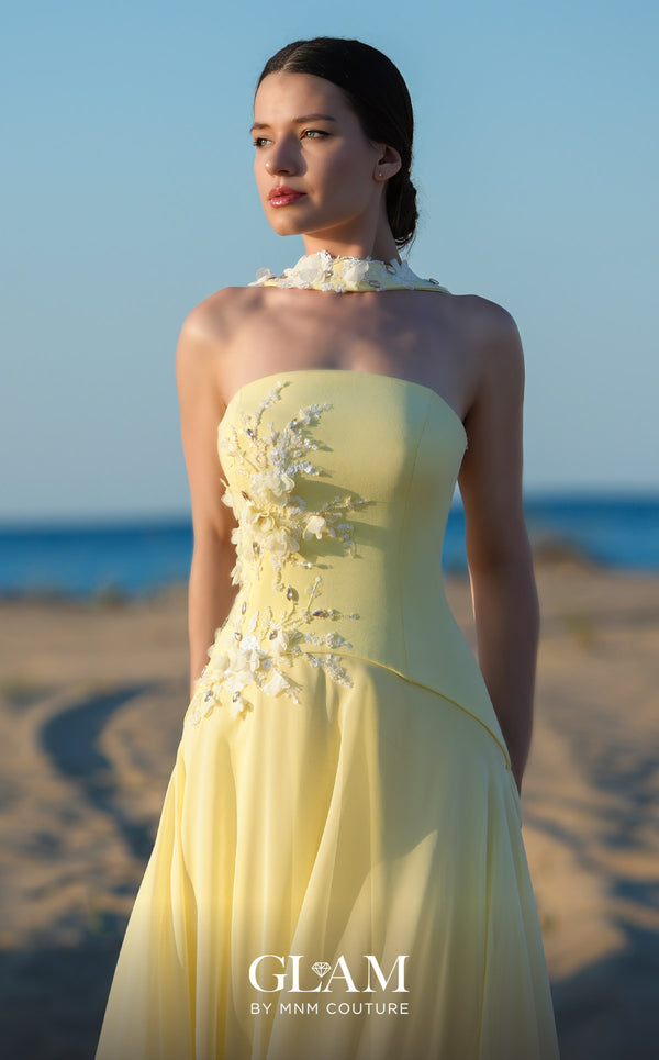 MNM Couture O09001 butter yellow strapless chiffon A-line gown with 3D white floral and crystal bodice appliqués, slight train, and detachable floral choker with two chiffon écharpe panels | Couture Shop LA