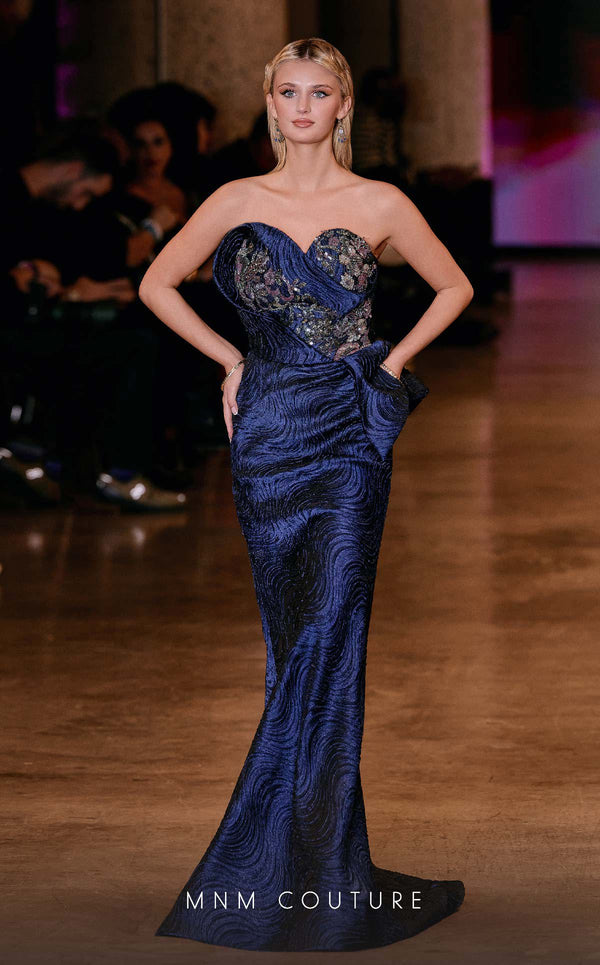 MNM Couture Style Q2908 strapless brocade mermaid gown with beaded embellishments, asymmetrical neckline, and side peplum. \ Couture Shop LA