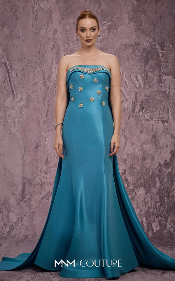 MNM Couture Style Q5574 strapless mermaid gown with rhinestone embellishments and a bow train. \ Couture Shop LA