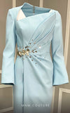 MNM Couture V02055 light blue rayon crepe column gown with train, asymmetric neckline, and rhinestones.| Couture Shop LA