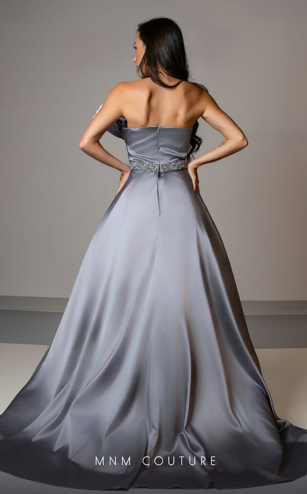MNM Couture V07353 asymetric sleevless satin column gown with ruffles and beadwork. | Couture Shop LA