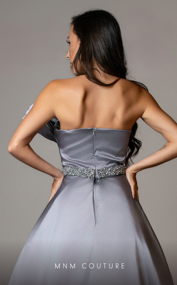MNM Couture V07353 asymetric sleevless satin column gown with ruffles and beadwork. | Couture Shop LA