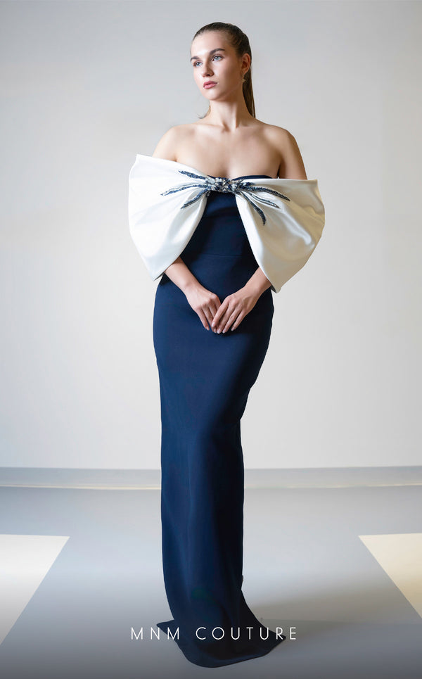 MNM Couture V07508 satin gown with cap sleeves and bow embellishment. | Couture Shop LA
