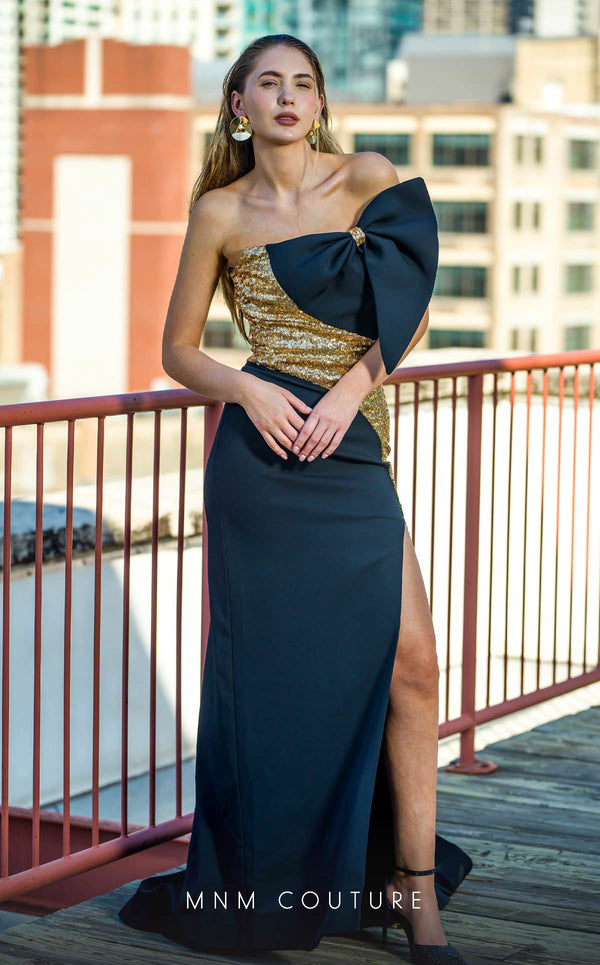 MNM Couture V07567 black and gold rayon crepe column dress with floral embellishments and square neckline.| Couture Shop LA