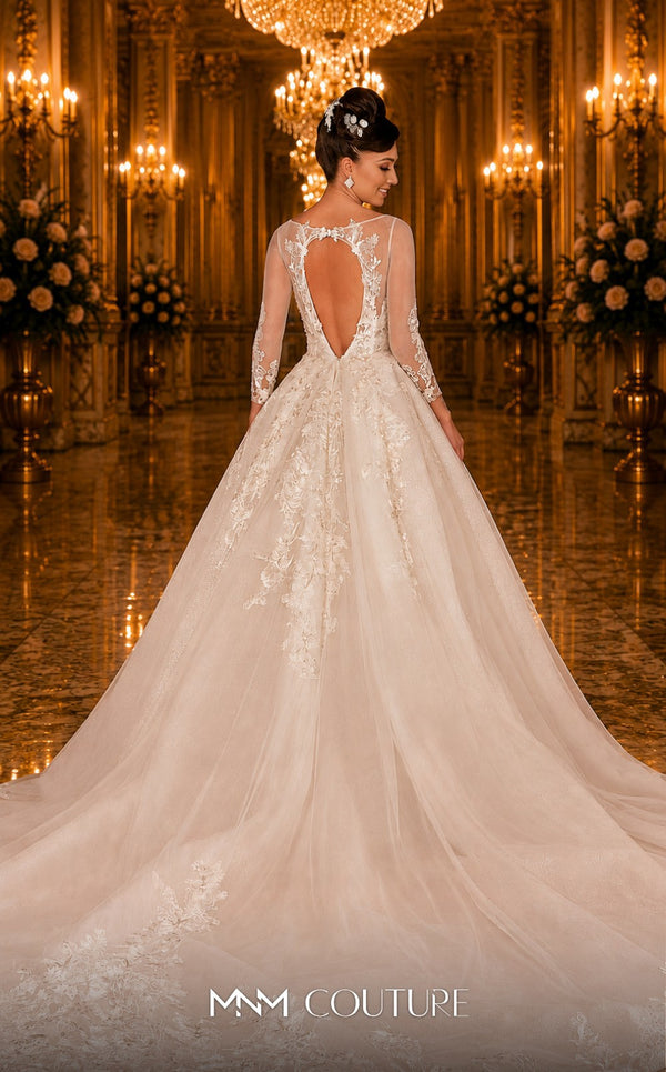 MNM Couture W2104 princess gown with lace applique-trimmed tulle layers and sheer sleeves. | Couture Shop LA