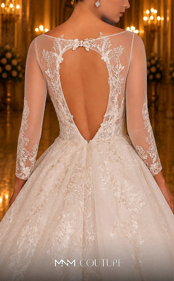 MNM Couture W2104 princess gown with lace applique-trimmed tulle layers and sheer sleeves. | Couture Shop LA