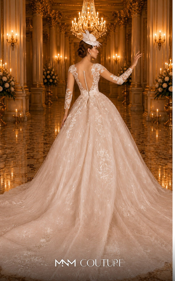 MNM Couture W2105 ball gown with sheer sleeves and lace applique detailing. | Couture Shop LA