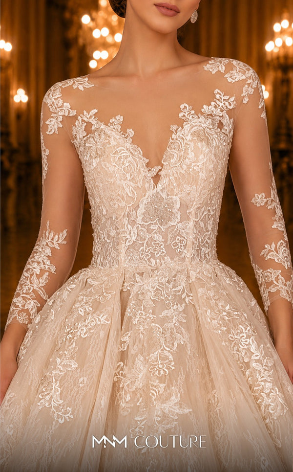 MNM Couture W2105 ball gown with sheer sleeves and lace applique detailing. | Couture Shop LA