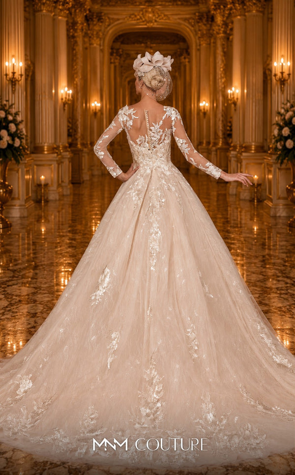 MNM Couture W2106 princess gown with sheer sleeves, lace overlays, and intricate beaded details. | Couture Shop LA