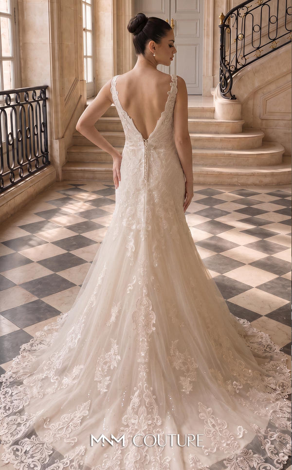 MNM Couture W3577 ivory and champagne mermaid wedding dress with all-over scrolling botanical lace, wide scalloped lace straps, deep plunging V-neckline, deep V-back with corset lace-up, and chapel train with scalloped lace border | Couture Shop LA