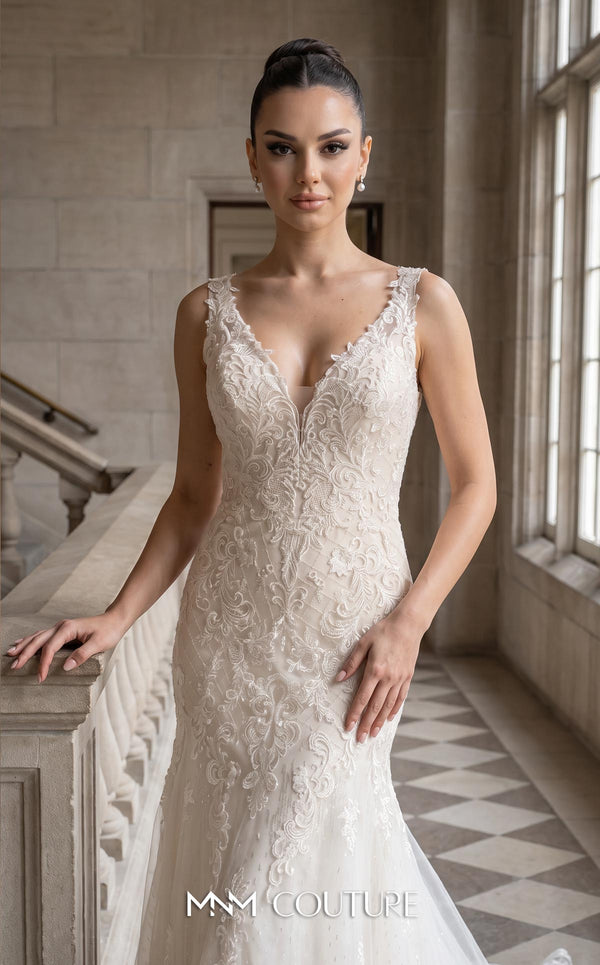MNM Couture W3577 ivory and champagne mermaid wedding dress with all-over scrolling botanical lace, wide scalloped lace straps, deep plunging V-neckline, deep V-back with corset lace-up, and chapel train with scalloped lace border | Couture Shop LA
