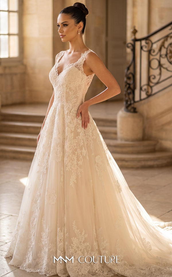MNM Couture W3580 champagne A-line wedding dress with deep V-neckline, thin spaghetti straps, dramatically deep V open back, scattered 3D floral lace appliqués, and flowing tulle skirt with sweep train | Couture Shop LA