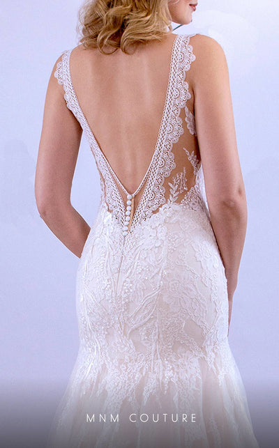 MNM Couture 10084 tulle dress with an A-line design, lace details, and a beautifully sheer bodice.| Couture Shop LA