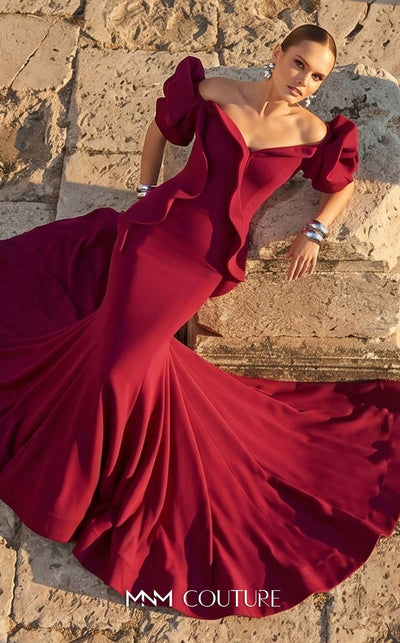MNM Couture 2328 off-shoulder gown with ruffled details, sweetheart neckline, and flowing mermaid hem.| Couture Shop LA