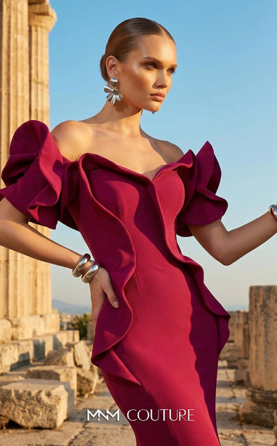 MNM Couture 2328 off-shoulder gown with ruffled details, sweetheart neckline, and flowing mermaid hem.| Couture Shop LA