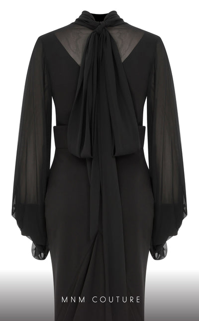 A captivating MNM Couture 2637A mermaid gown showcasing bishop sleeves, a jewel neckline, and a sweep train for high-fashion elegance. | Couture Shop LA