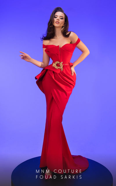 A stunning off-shoulder MNM Couture 2650 sheath gown with a plunging sweetheart neckline, ruffled peplum details, and a sweep train for a dramatic look. | Couture Shop LA