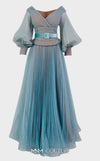 MNM Couture 2686 organza crinkle flared dress with embroidered details, belt, and puffed sleeves.