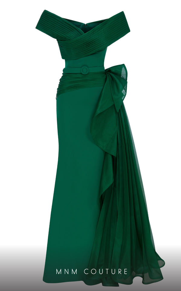 A sophisticated MNM Couture 2692 off-shoulder mermaid gown featuring pleated foldover details, ruffled side peplums, and a sweeping train. | Couture Shop LA