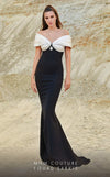 Long strapless evening dress with ruched detailing and an elegant extended train.