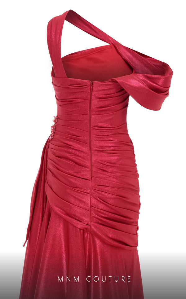 MNM Couture 2792: Asymmetrical mermaid evening gown with metallic sheen, bold embellishments, and a captivating silhouette. | Couture Shop LA.