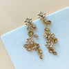 AUE463 gold metal earrings with long floral rhinestones| Couture Shop LA