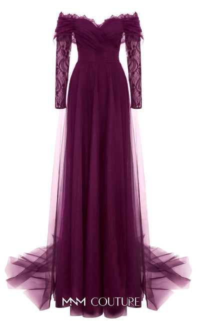MNM Couture Style B1141 featuring a flared black organza gown with an off-the-shoulder sweetheart neckline, long sleeves, and a long, flowing train cape at the back.| Couture Shop LA.