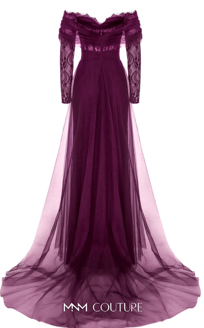 MNM Couture Style B1141 featuring a flared black organza gown with an off-the-shoulder sweetheart neckline, long sleeves, and a long, flowing train cape at the back.| Couture Shop LA.