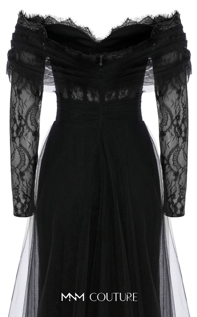 MNM Couture Style B1141 featuring a flared black organza gown with an off-the-shoulder sweetheart neckline, long sleeves, and a long, flowing train cape at the back.| Couture Shop LA.