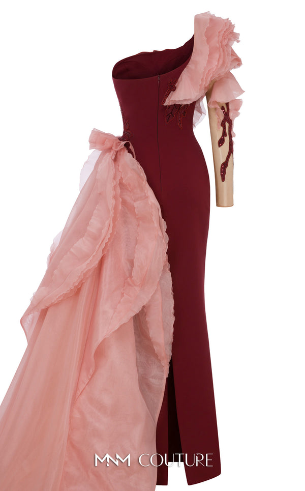 MNM Couture Style B1152 showcasing a fitted column dress in black/blue rayon crepe with an illusion neckline, long sleeves, shoulder embroidery, and a one-sided detachable train skirt. | Couture Shop LA