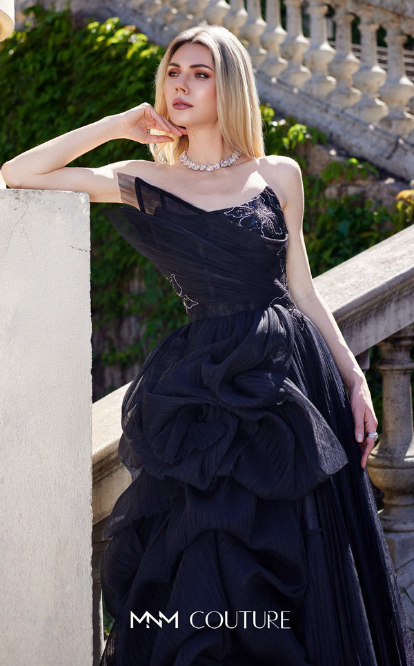MNM Couture B1168 sleeveless tulle gown with a pleated, beaded bodice, asymmetric neckline, and a full A-line skirt with side ruffles. | Couture Shop LA