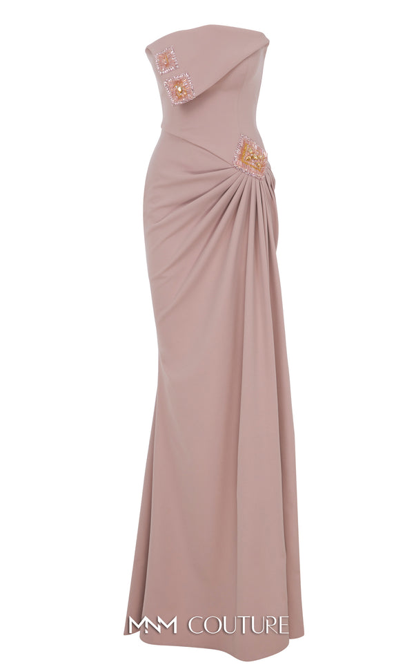 MNM Couture Style B1171 showcasing a pink sleeveless column dress in rayon crepe with a straight-across neckline, rhinestone triangle accent on the bust, and pleated waist detail. | Couture Shop LA