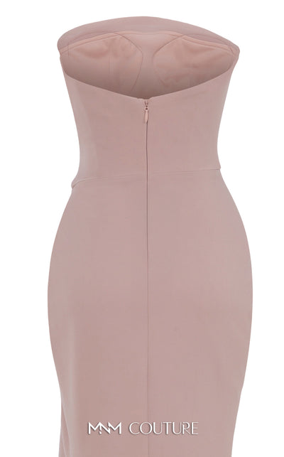 MNM Couture Style B1171 showcasing a pink sleeveless column dress in rayon crepe with a straight-across neckline, rhinestone triangle accent on the bust, and pleated waist detail. | Couture Shop LA